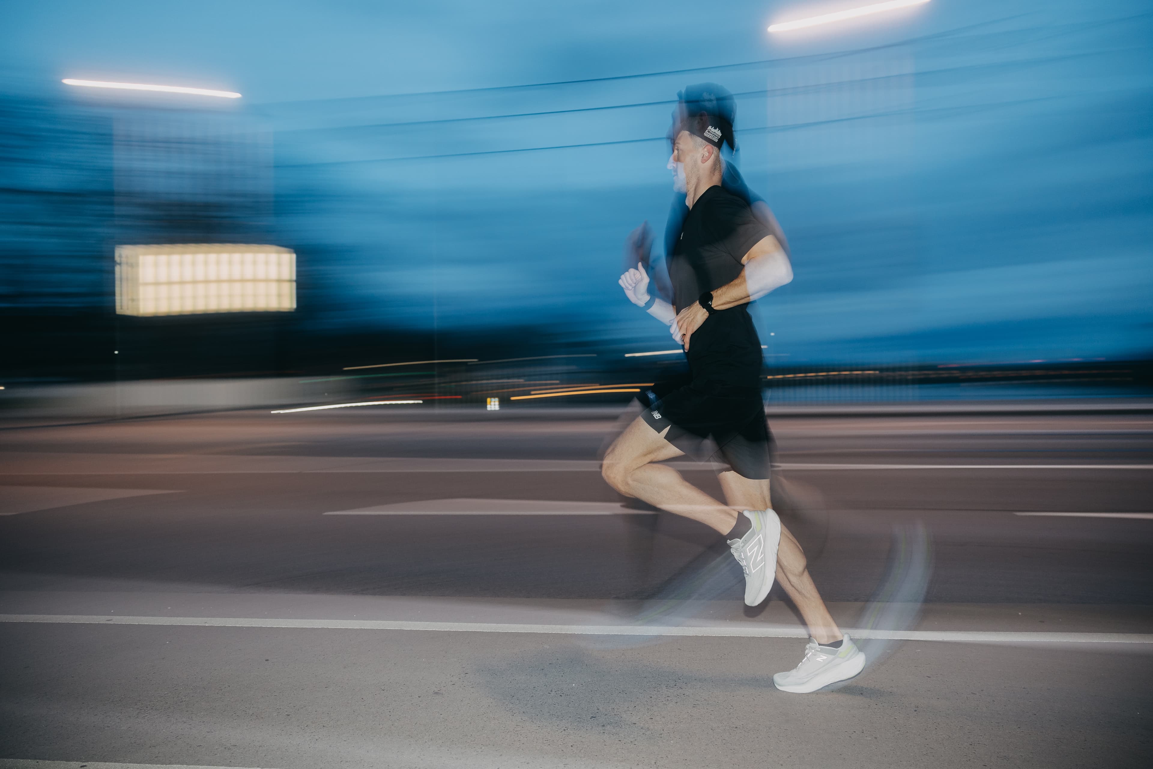 Kevin running at night with motion blur
