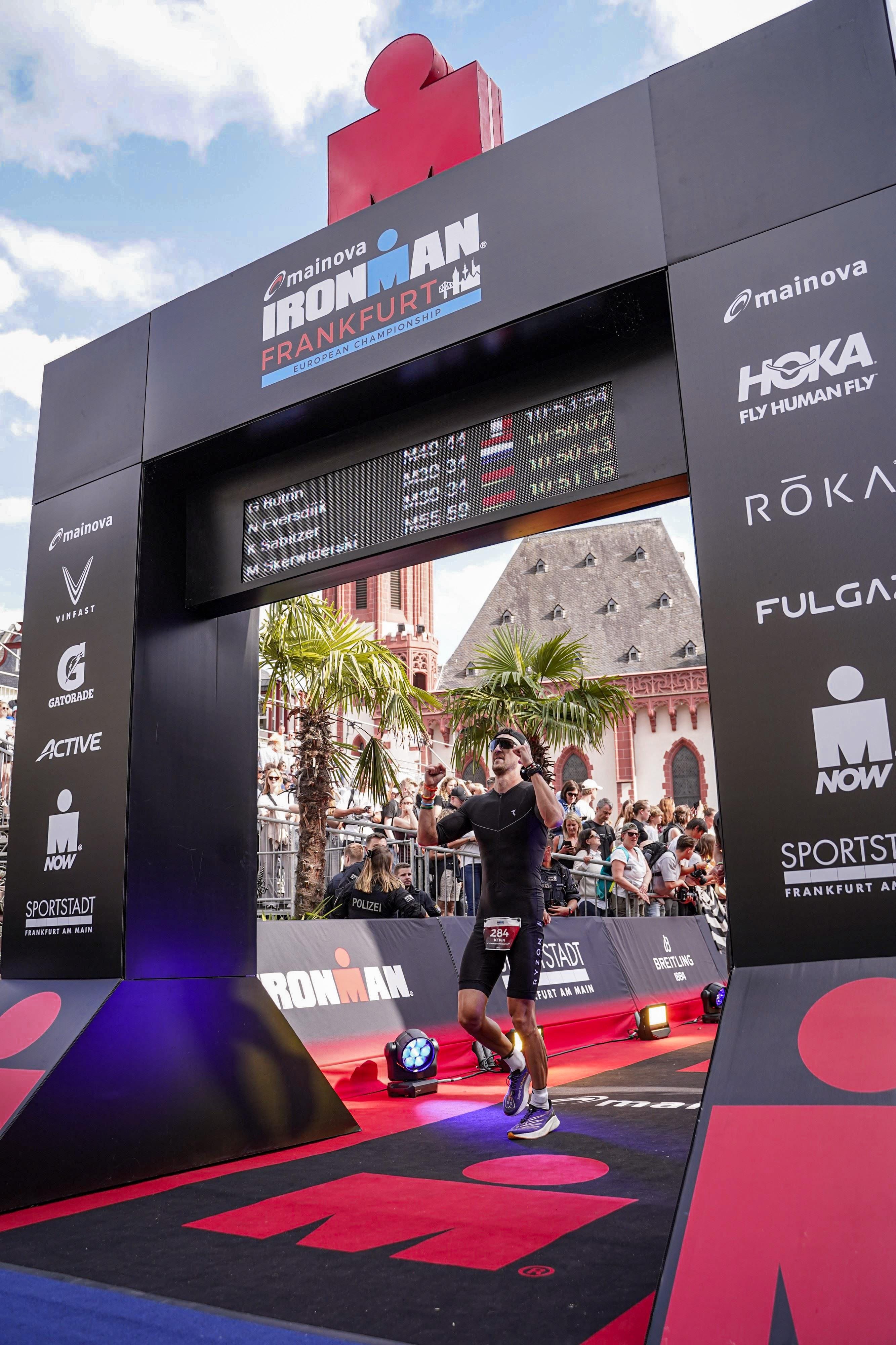 Kevin - professional portrait holding a cup of coffee